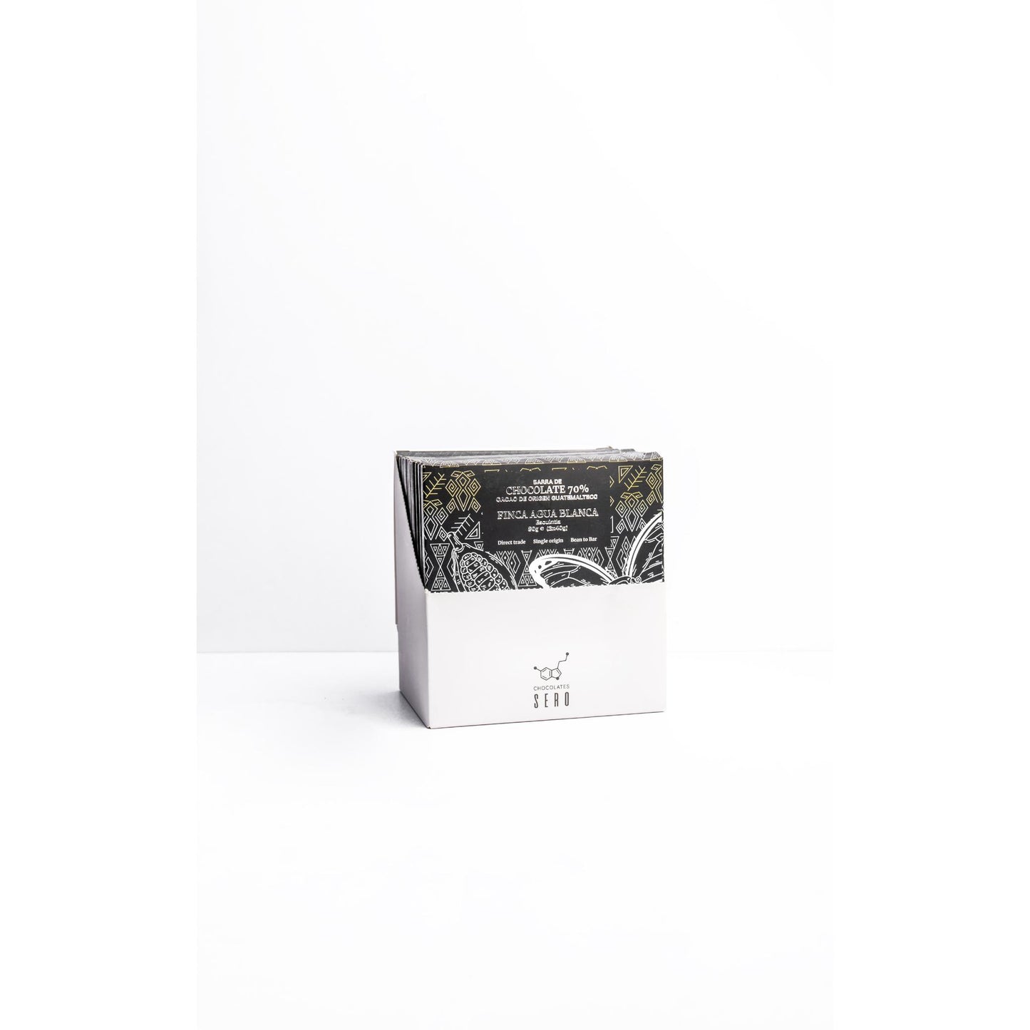 Caja de 10 barras de 80g de origen Agua Blanca. Chocolate 70% oscuro fino de aroma de origen guatemalteco. 10 barras de chocolate sero.