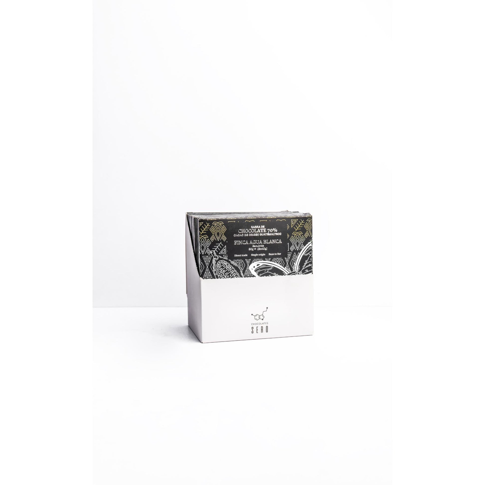 Caja de 10 barras de 80g de origen Agua Blanca. Chocolate 70% oscuro fino de aroma de origen guatemalteco. 10 barras de chocolate sero.