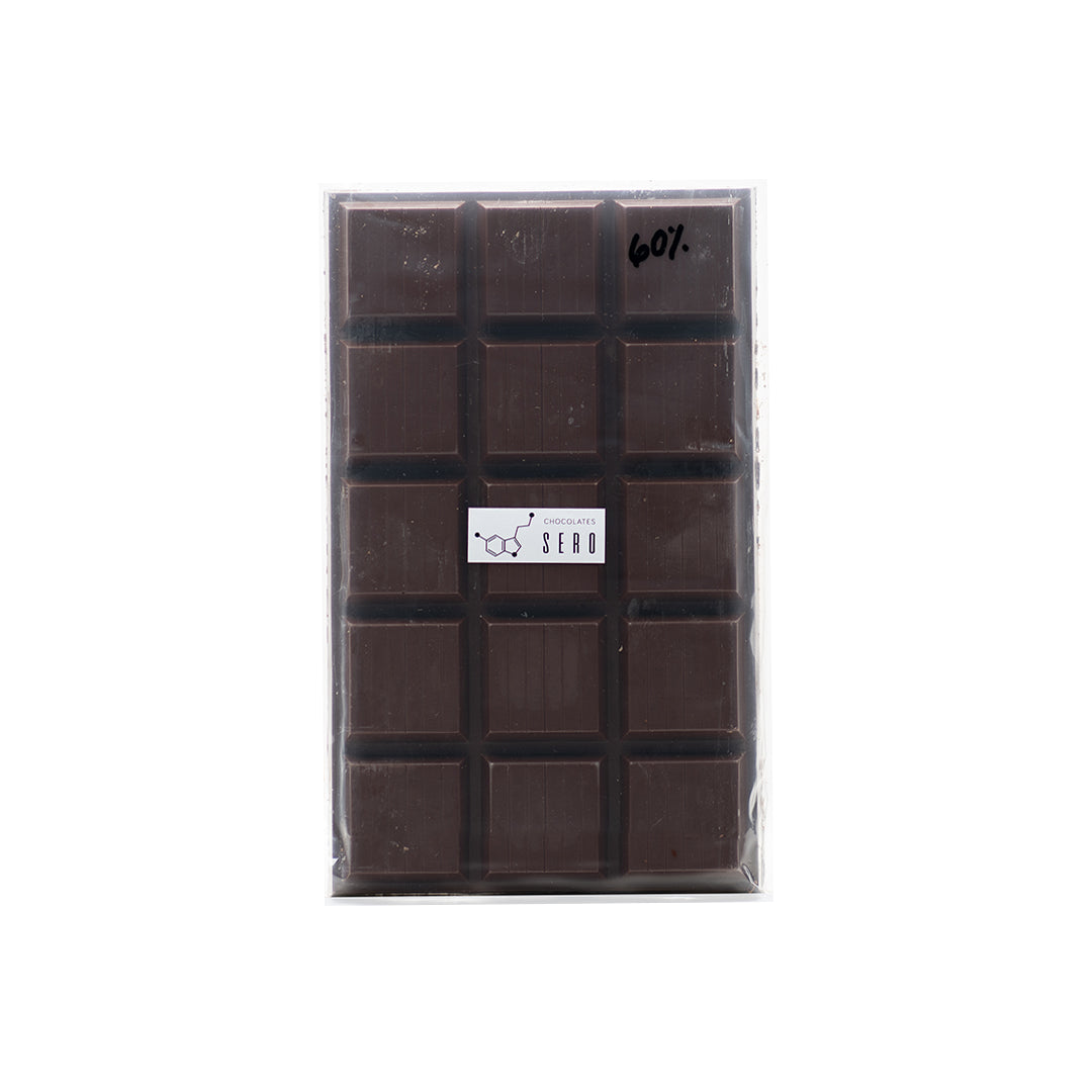 2 lb (908g) block of couverture dark chocolate made from Guatemalan cacao, packaged by Chocolates Sero. Ideal for professional kitchens and home baking, offering rich flavor, smooth melt, and ethically sourced ingredients.
