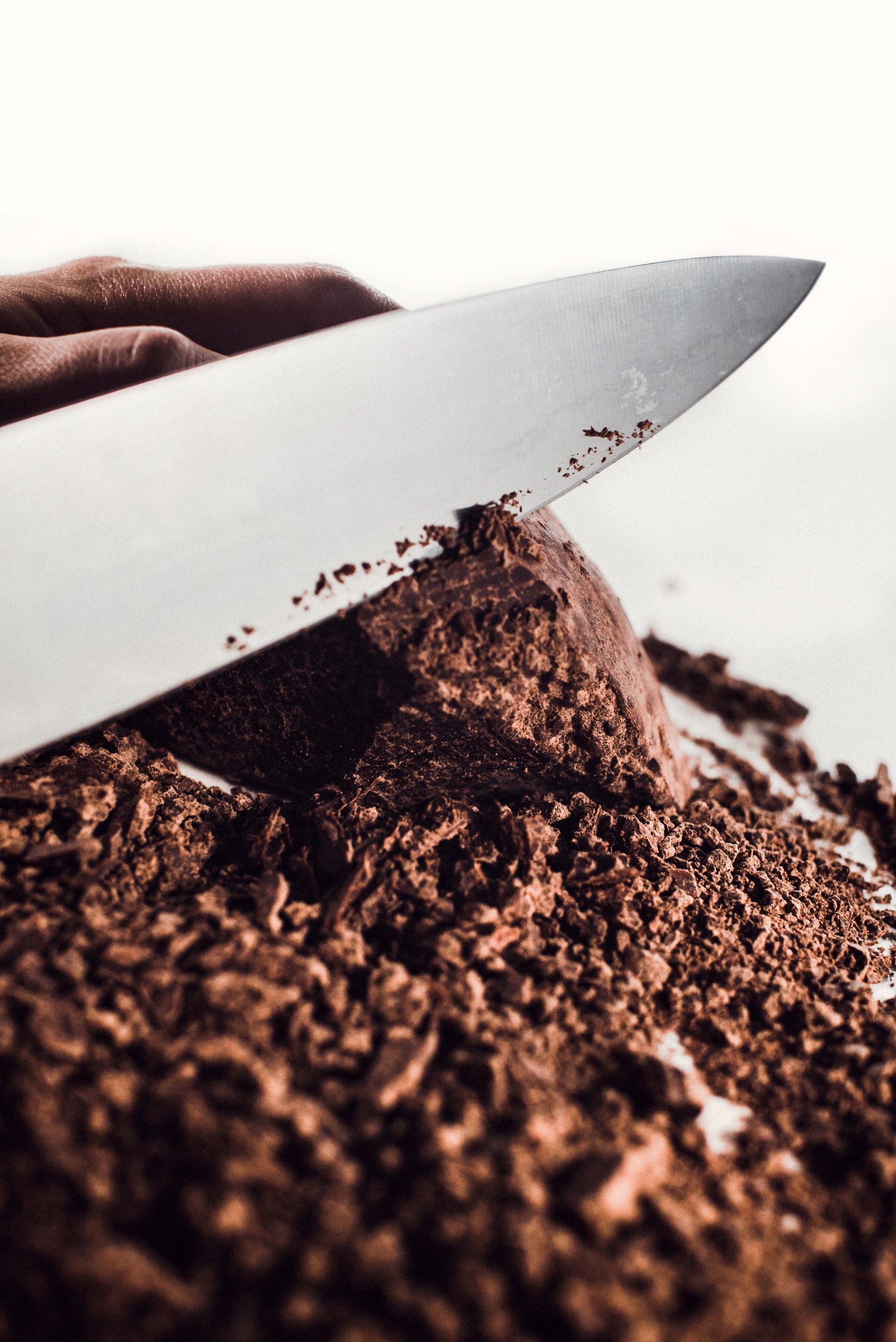 Unwrapped block of artisan Guatemalan cacao paste on white background — showcasing pure texture, origin integrity, and handcrafted quality by Chocolates Sero