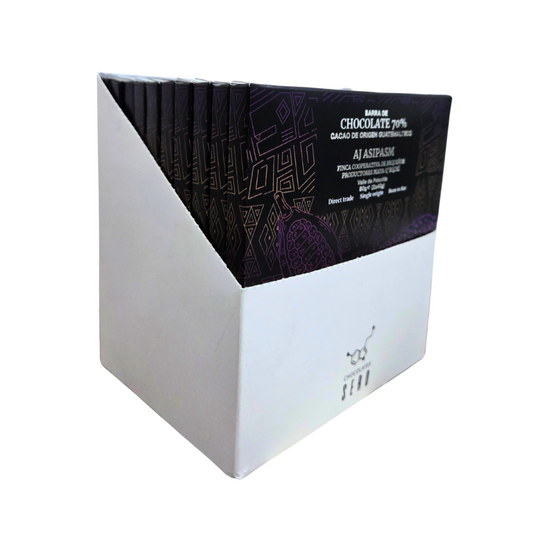 Box of 10 Chocolates Sero bars — 80g each, made with 70% single origin cacao from Aj Asipasm cooperative in Guatemala. Elegant black packaging highlights ethical sourcing, biodiversity, and artisan craft.