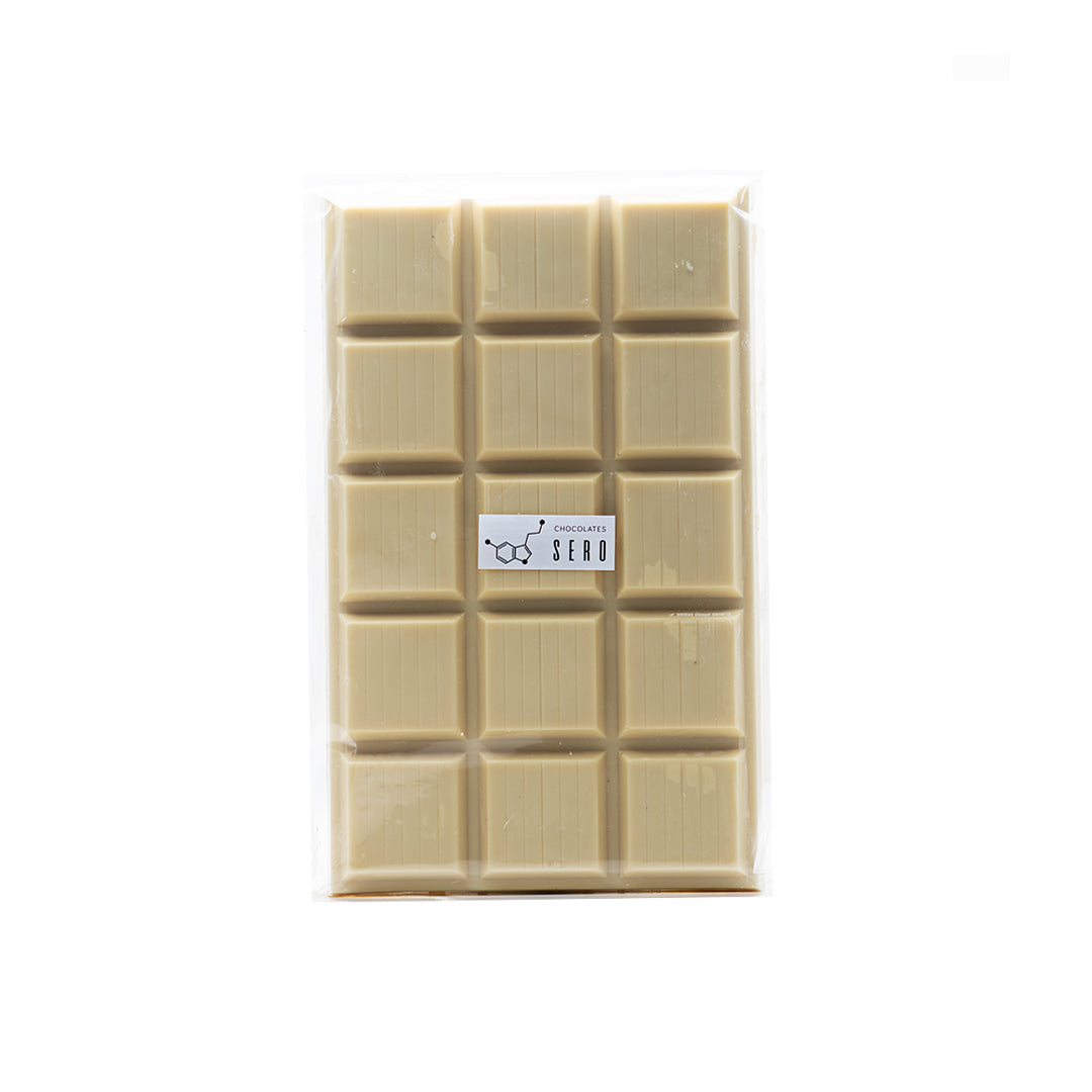 2 lb (908g) block of couverture white chocolate made from Guatemalan cacao, packaged by Chocolates Sero. Ideal for professional kitchens and home baking, offering smooth melt, rich flavor, and ethical sourcing.