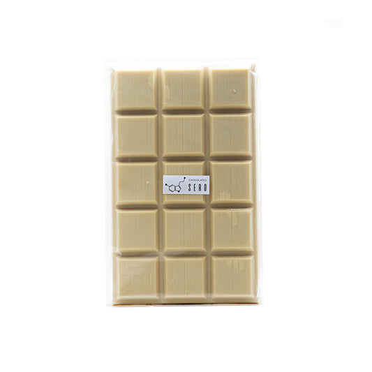 2 lb (908g) block of couverture white chocolate made from Guatemalan cacao, packaged by Chocolates Sero. Ideal for professional kitchens and home baking, offering smooth melt, rich flavor, and ethical sourcing.
